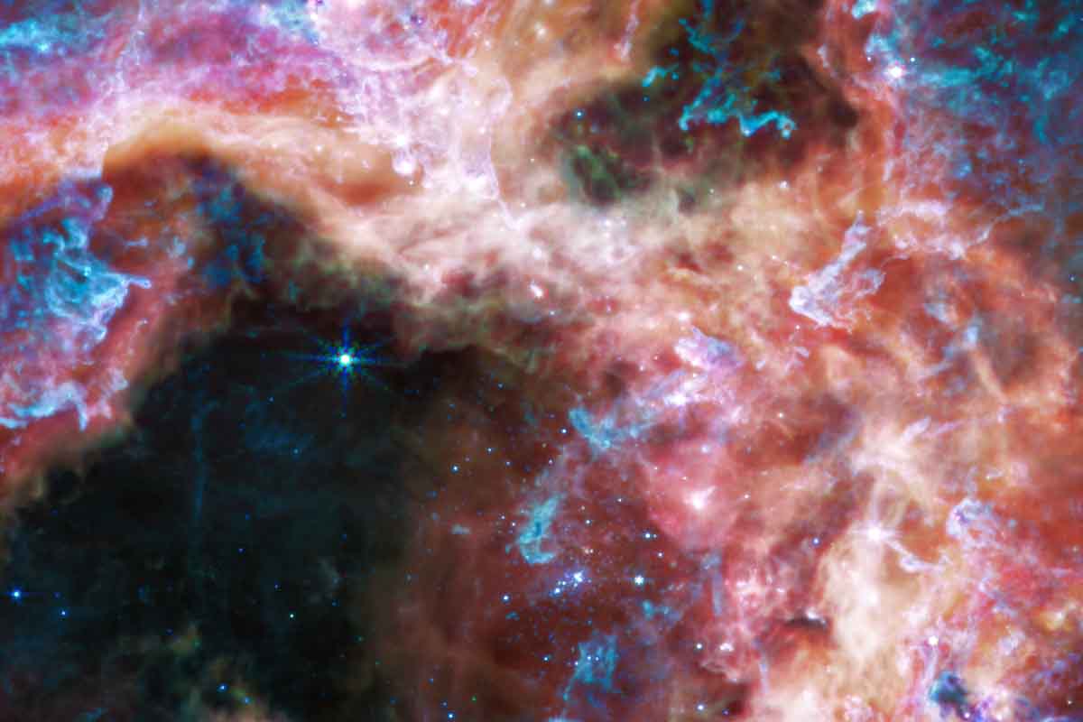 Hmlovina Tarantula vedcom ukazuje región, kde vznikajú tisíce nových hviezd